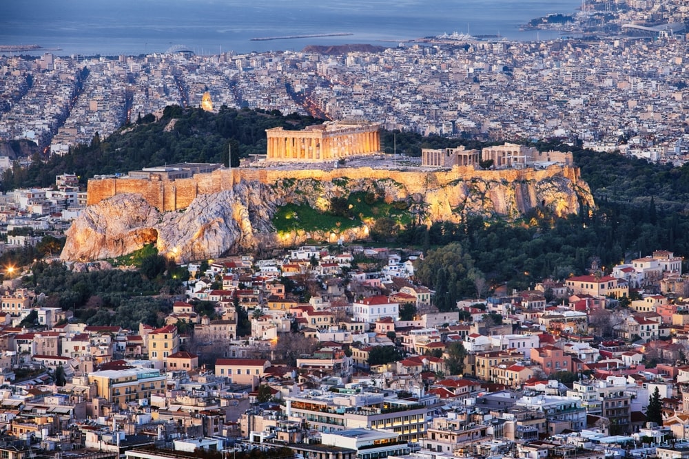 Aerial view over Athens with te Acropolis and harbour from Lycabettus hill